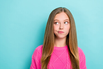 Photo of uncertain thoughtful girl with straight hairstyle wear pink knit sweater look empty space...