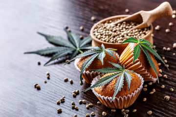 Cupcake with marijuana.traditional sponge cake with cannabis weed cbd. Medical marijuana drugs in food dessert, ganja legalization.