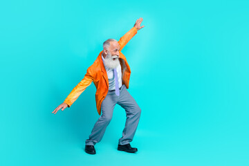 Full length photo of positive man trendy vintage clothes imagine plane travel abroad look empty space isolated on cyan color background