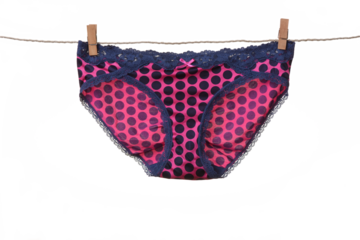 Women's panties hanging on rope 