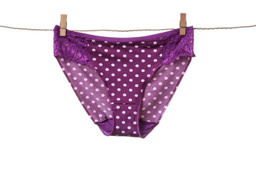 Women's panties hanging on rope