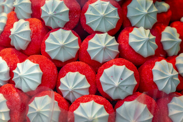 Selective focus of red and white marshmallow berries display on  candy shop, Marshmallow is a type...