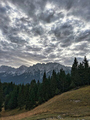 Landscape with dramatic clouds and sun rays over mountains - Mittenwald Wetterstein