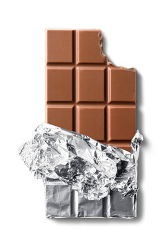 Top view of bitten milk chocolate bar in folio