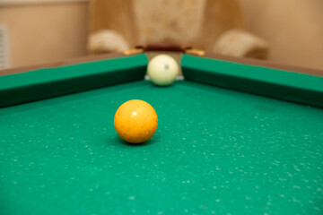 Billiard table. Balls and cue. Russian billiards.