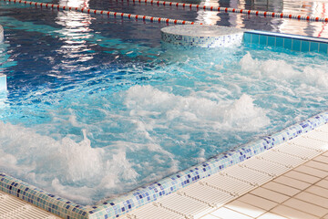 A pool with boiling water. Water massage.
