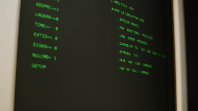 Retro pc with loading code console, programmer making scripts, green basic screen, Old computer studio close-up, Desktop vintage retro wave display, late 90s PC.