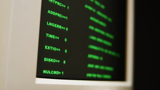 Retro pc with loading code console, programmer making scripts, green basic screen, Old computer studio close-up, Desktop vintage retro wave display, late 90s PC.