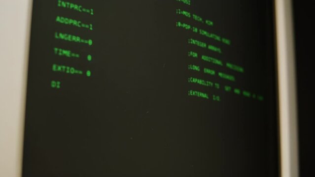 Retro pc with loading code console, programmer making scripts, green basic screen, Old computer studio close-up, Desktop vintage retro wave display, late 90s PC.