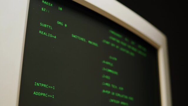 Retro pc with loading code console, programmer making scripts, green basic screen, Old computer studio close-up, Desktop vintage retro wave display, late 90s PC.