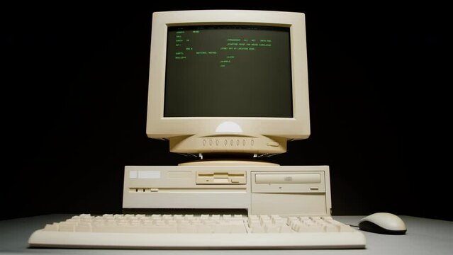 Retro pc with loading code console, programmer making scripts, green basic screen, Old computer studio close-up, Desktop vintage retro wave display, late 90s PC.