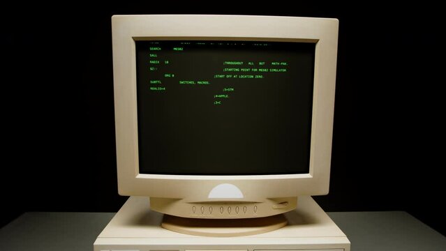 Retro pc with loading code console, programmer making scripts, green basic screen, Old computer studio close-up, Desktop vintage retro wave display, late 90s PC.