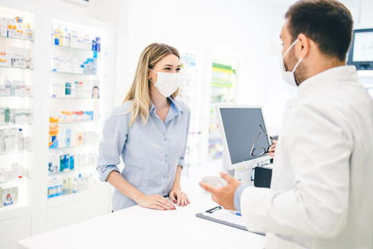 Pharmacy worker and customer stock photo
Customer buying some pharmacy products