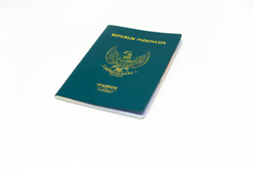 Indonesian electronic passport and regular passport isolated on white background