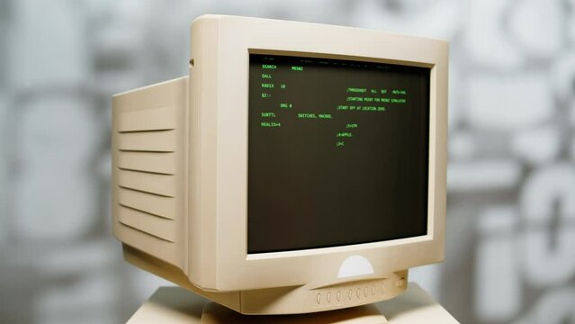 Retro pc with loading code console, programmer making scripts, green basic screen, Old computer studio close-up, Desktop vintage retro wave display, late 90s PC.
