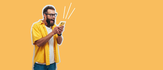 Young bearded charismatic man in glasses uses a smartphone. Online communication with friends....