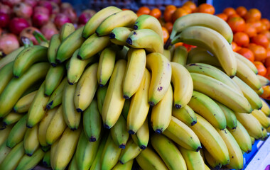 Closeup view on ripe bananas on the market. High quality photo