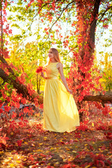 girl in yellow dress autumn foliage