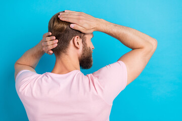 Photo portrait of handsome young guy back view touch hair hand haircut dressed stylish pink outfit...