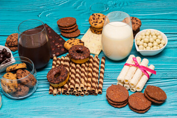 Chocolate milk with heap of sweets
