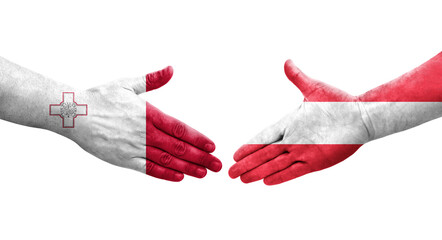 Handshake between Malta and Austria flags painted on hands, isolated transparent image. - obrazy, fototapety, plakaty