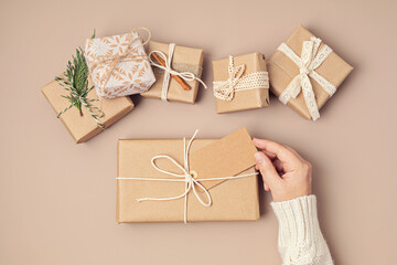 Christmas background with gift boxes. Xmas celebration, preparation for winter holidays, secret...