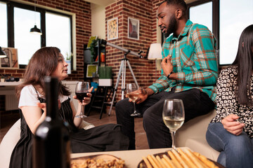 Different ethnicities couple friends, man, woman, colleagues, partners, mates, talking, discussing,...