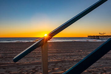 Sunrise from a lifeguard tower near the pier