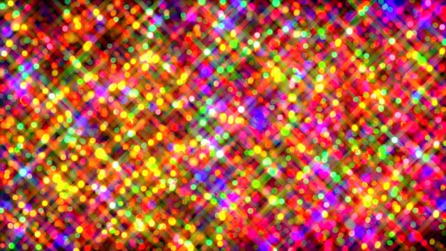 A composite image of vibrant festive Christmas bokeh light particles in a retro style with flickering light lens flare glint background.
