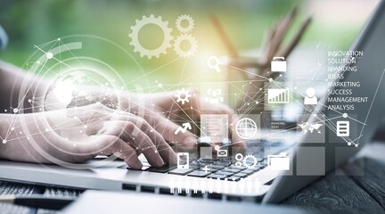 Business man working on computer with info-graphic