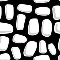 white stones pattern on black background 