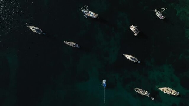 Fishboat and sailboats in leros greece