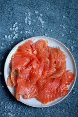 Close-up. Salted salmon fillet on a plate.