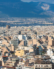 Naklejka premium Athens, Attica, beautiful super-wide angle view of Athens city, Greece, Mount Lycabettus, mountains and scenery beyond the city, seen from The Parthenon, temple on the Athenian Acropolis