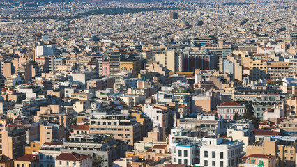 Obraz premium Athens, Attica, beautiful super-wide angle view of Athens city, Greece, Mount Lycabettus, mountains and scenery beyond the city, seen from The Parthenon, temple on the Athenian Acropolis