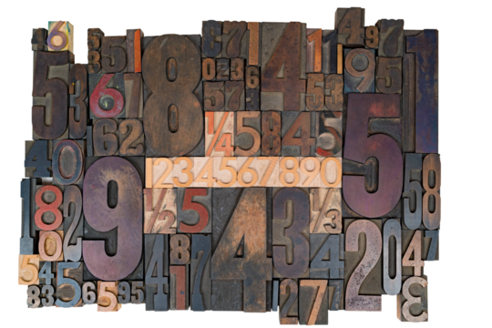 Isolated set of vintage letterpress type numbers of different sizes