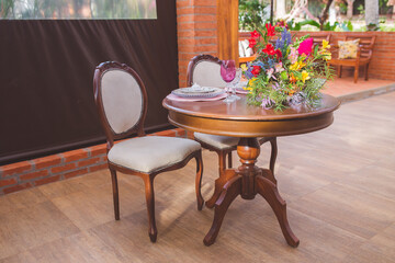 bride and groom table decorated for wedding party 