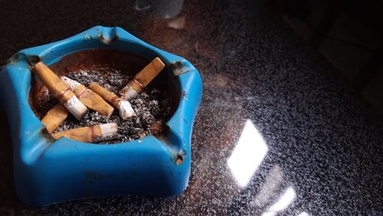 ashtray with cigarette