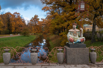 View of the Large Chinese Bridge in Alexander Park in Tsarskoye Selo on a sunny autumn day,...