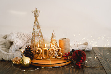 Happy New Years 2023. Christmas background with fir tree, cones and Christmas decorations. Christmas holiday celebration. New Year concept.