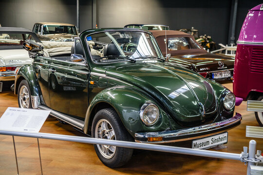 SINSHEIM, GERMANY - MAI 2022: dark green Volskwagen VW Kaefer 1303 Cabrio 1979