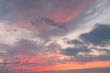 Naklejka na ściany i meble Pink Sunset Sky with Different Clouds.