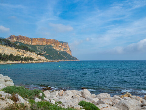 Cassis, France - May 18th 2022: View towards the red cliffs of Cap Canaille.
