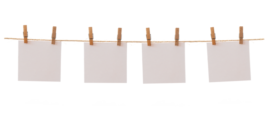 Four frames that hang on a rope with clothespins and isolated on white. Blank cards on rope mockup template