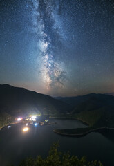 Milky way over Vacha dam, Bulgaria.  © ValStock