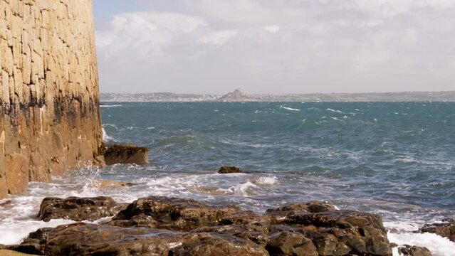 Ocean waves against sea wall - Cornwall, United Kingdom - 4K Slow Motion Cinematic