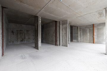 Empty concrete commercial space without finishing with partitions