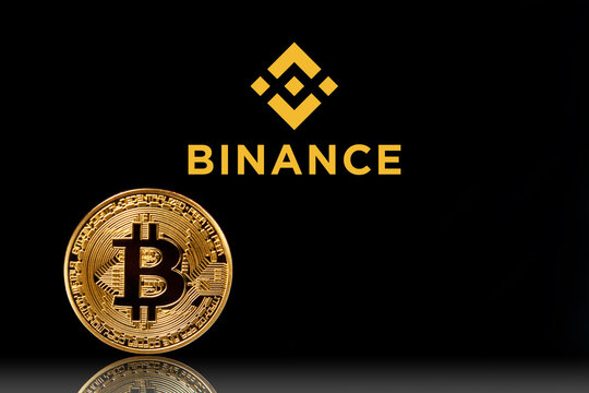 Binance logo with bitcoin on black background. Binance - one of the largest cryptocurrency exchange on the market. Moscow, Russia - November 1, 2022.