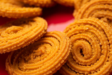 Chakli is a savoury snack from India. It is a spiral shaped snack with a spiked surface