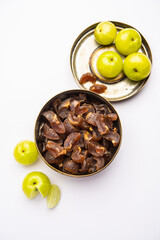 Fototapeta na wymiar digestive dried amla candy with fresh Indian gooseberry